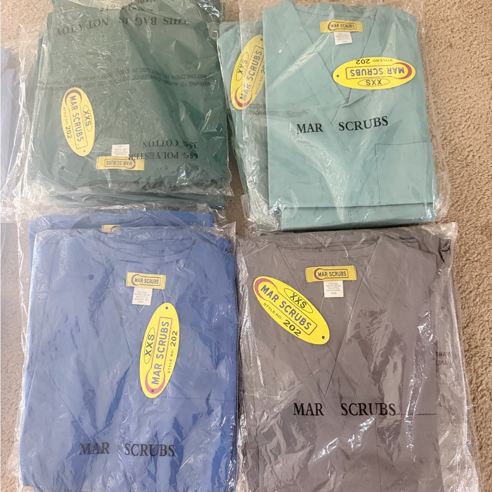 BRAND NEW MAR SCRUBS $15each
